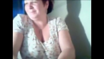 Older Woman Exposes Her Breasts On Webcam