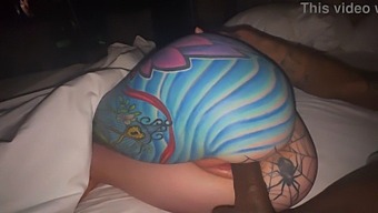 A Couple'S Sensual Encounter With A Black Man And A Tattooed Woman